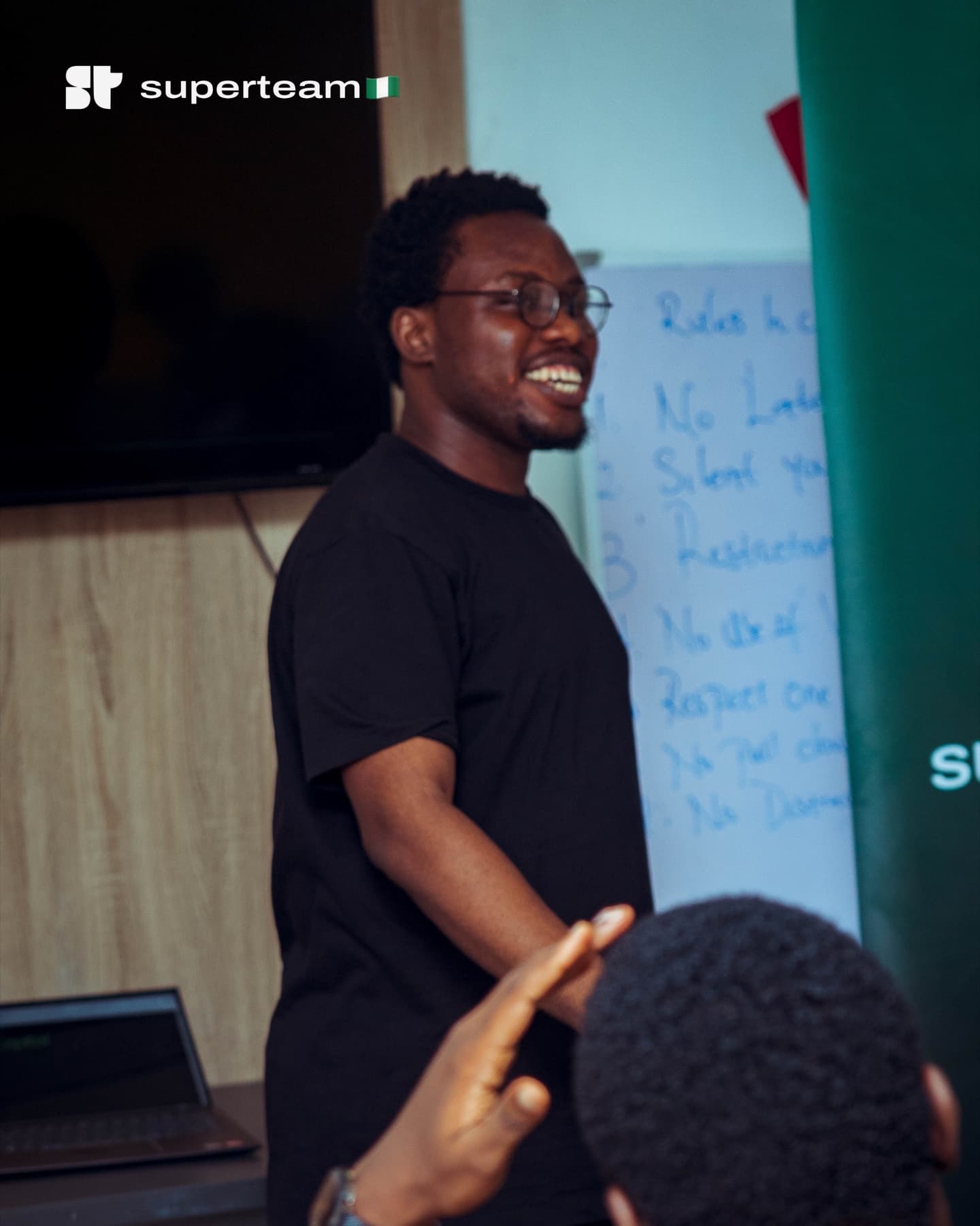 Victor speaking and smiling during a workshop